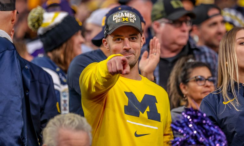 Connor Stalions in the stands at Washington