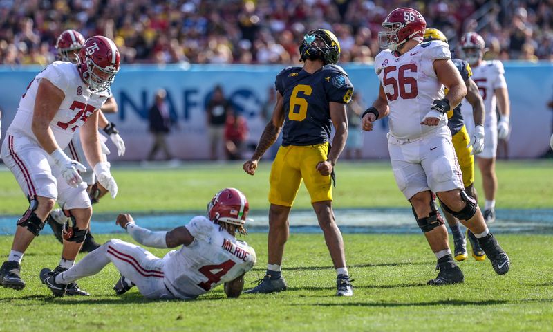 Brandyn Hillman celebrates a sack vs Alabama