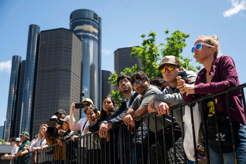 Racing fans watch the IndyCar qualifying races during the Detroit Grand Prix.