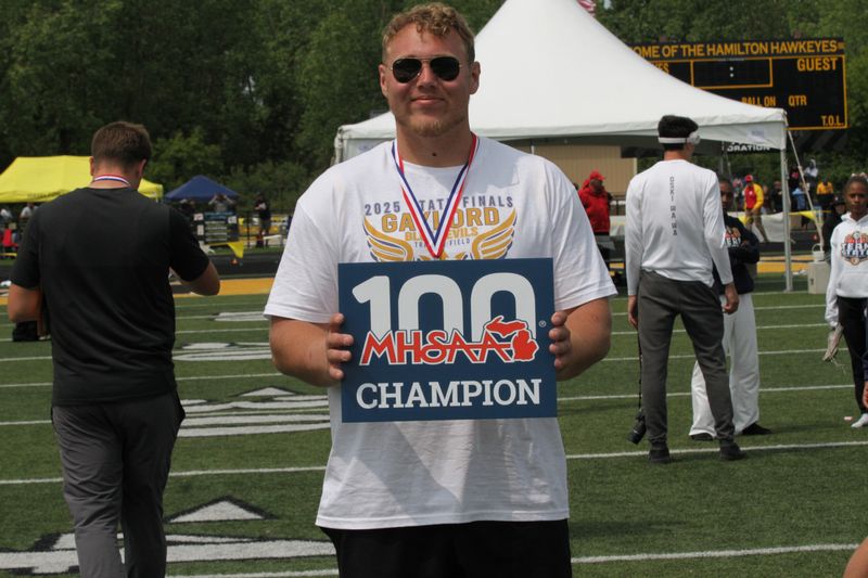 Gaylord's Zachary Cowper set a new school record in shot put with a throw of 65 feet, 0.5 inches, winning the Division 2 state championship on Saturday, May 31 in Hamilton, Mich.