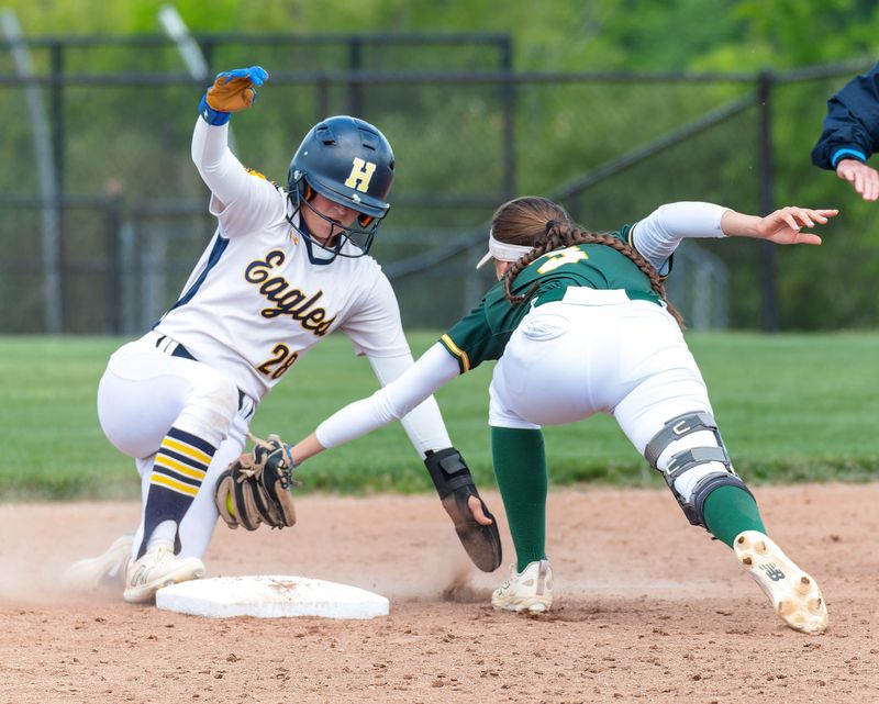 Hartland outfielder Skylar Spisz (28) and Howell shortstop Addison Caldwell (3) made the all-KLAA West softball team.