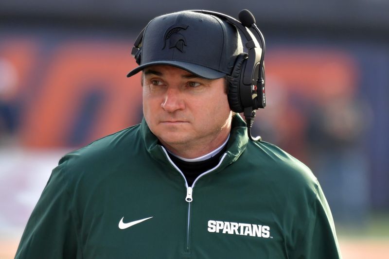 Nov 16, 2024; Champaign, Illinois, USA; Michigan State Spartans head coach Jonathan Smith during the first half against the Illinois Fighting Illini at Memorial Stadium. Mandatory Credit: Ron Johnson-Imagn Images