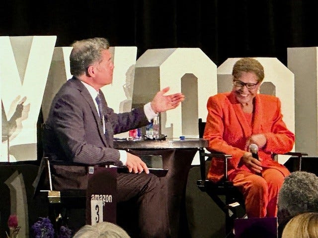 News anchor Frank Buckley and Los Angeles Mayor Karen Bass talk travel at the Loews Hollywood Hotel.