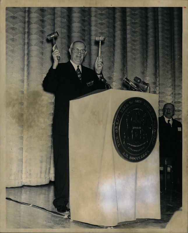 At the 1963 Michigan Constitutional Convention, Chairman Stephen S. Nisbet gavels the convention to order.