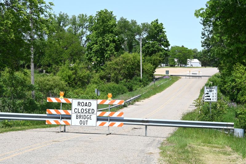 Steel barricades closed Log Road at the Swan Creek bridge on May 29.