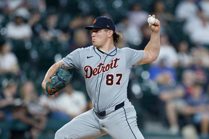 Detroit Tigers relief pitcher Tyler Holton (87) delivers a pitch against the Chicago White Sox during the sixth inning at Rate Field in Chicago on Tuesday, June 3, 2025.