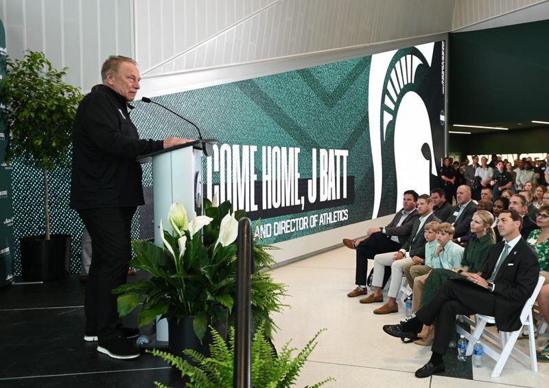 Michigan State University basketball coach Tom Izzo speaks, Wednesday, June 4, 2025, before MSU President Kevin Guskiewicz
introduced J Batt (bottom r.) as the Spartanâ€™s new athletic director.
