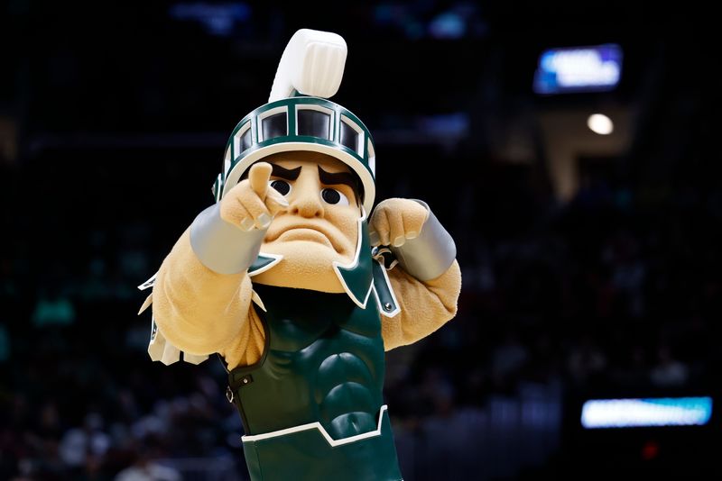 Mar 23, 2025; Cleveland, OH, USA; Michigan State Spartans mascot “Sparty” performs in the first half against the New Mexico Lobos during the NCAA Tournament Second Round at Rocket Arena. Mandatory Credit: Rick Osentoski-Imagn Images