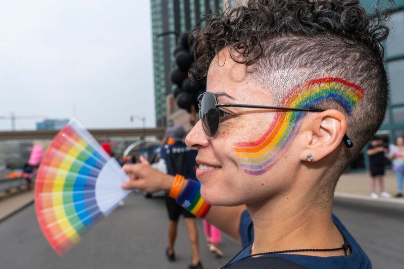 Jen Tindle wears rainbow makeup during the 2025 Motor City Pride Parade in Downtown Detroit, Michigan on Sunday, June 8, 2025.