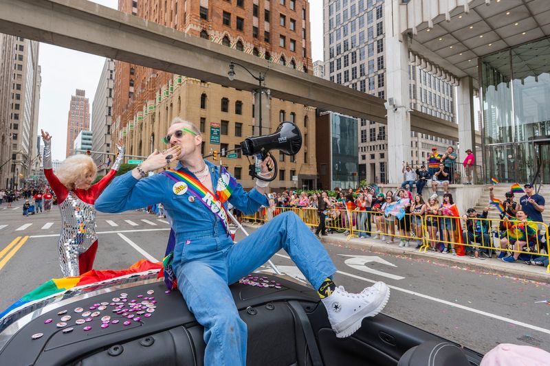 Robert Nelson blows a kiss to attendees at the 2025 Motor City Pride Parade in Downtown Detroit, Michigan on Sunday, June 8, 2025.