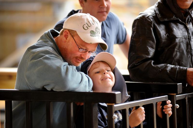 The excitement builds for Morgan Murray, 9, of Erie, as she waits with her father, Tim Murray, to ride the Ravine Flyer II roller coaster at Waldameer Park on its opening day May 17, 2008.