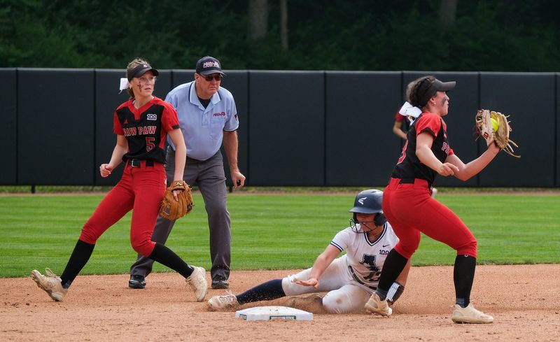 Carleton Airport's Olivia Tilley slides safely into second base during a 3-2 loss to Paw Paw in the Division 2 state softball semifinals on Thursday, June 12, 2025 at Seccia Stadium in East Lansing.