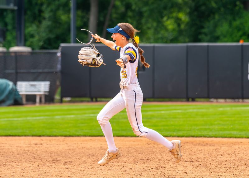 South Lyon's Isabella Bracali celebrates winning the Division 1 softball state semifinal on Friday, June 12, 2025, at Michigan State's Secchia Stadium.