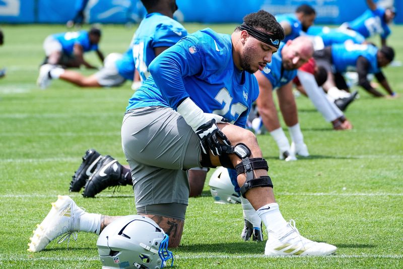 Detroit Lions guard Christian Mahogany (73) practices during OTA at Meijer Performance Center in Allen Park on Friday, May 30, 2025.