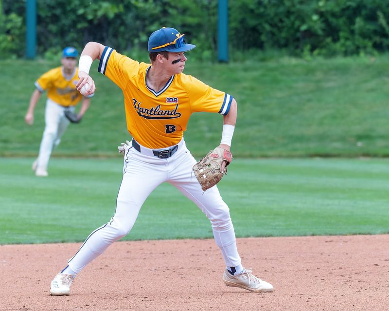 Hartland's Bobby Griffon throws the ball to first base during a MHSAA Division 1 semifinal victory over Grosse Pointe South Friday, June 13, 2025.