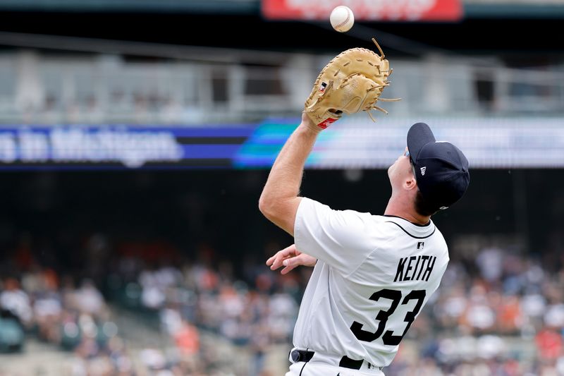 Tigers first baseman Colt Keith (33) makes a catch in the first inning against the Cincinnati Reds at Comerica Park in Detroit on Saturday, June 14, 2025.