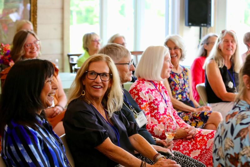 Members listen to grant presentations during the Hestia Women’s Giving Circle's annual meeting in 2024.