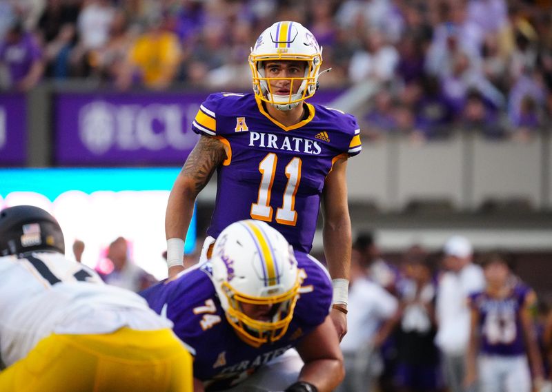 East Carolina Pirates quarterback Jake Garcia (11) looks on against Appalachian State during the second half at Dowdy-Ficklen Stadium on Sept. 14, 2024 in Greenville, North Carolina.