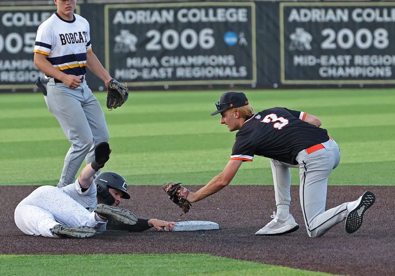 Xavier Gibbs of Onsted slides into second base as Summerfield's Tyler Dafoe applies a tag during the Monroe County-Lenawee County All-Star Baseball Game on Monday, June 16, 2025. Lenawee won 8-4.
