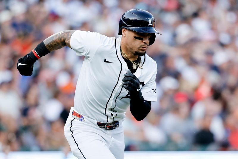 Detroit Tigers shortstop Javier Báez (28) runs the bases after hitting a home run in the fifth inning against the Pittsburgh Pirates at Comerica Park in Detroit on Tuesday, June 17, 2025.