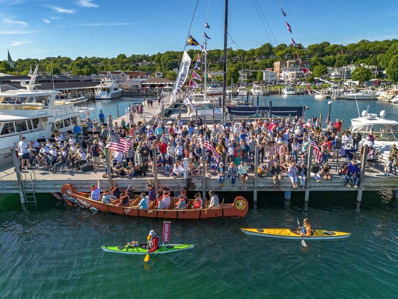 People gather at the city dock during the annual Blessing of the Fleet, hosted by the Harbor Springs Area Historical Society.
