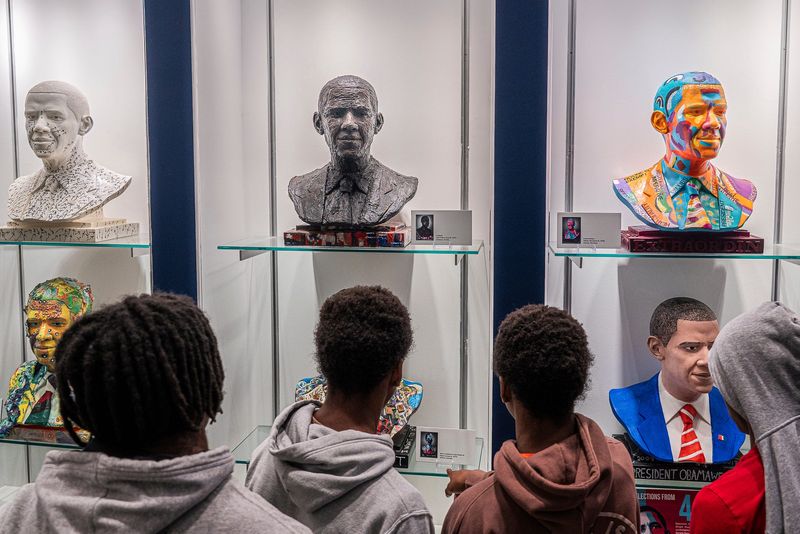 Young community members look at artistic busts of Former President Barack Obama during a Juneteenth celebration at the Charles H. Wright History Museum in Detroit on Thursday, June 19, 2025.
