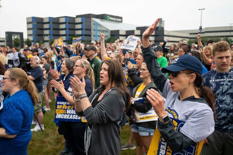 Nurses at Corewell Health East, represented by Teamsters Local 2024, gather for a rally to demand that their employer ends its attacks on unionized workers on June 21, 2025, at the Corewell Health Southfield Center in Southfield. Katy Kildee / The Detroit News