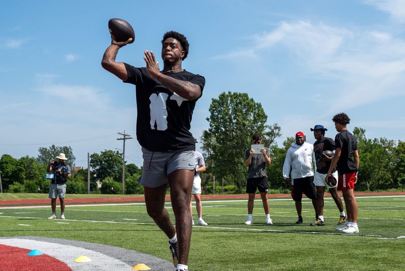 Aidan Chiles, 19, a Michigan State University quarterback, throws a football during a private workout in Detroit on Saturday, June 21, 2025.