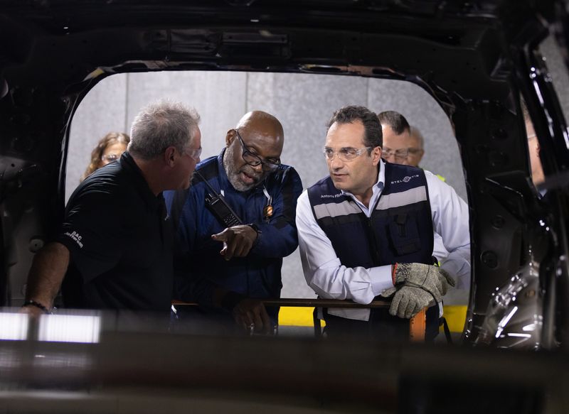 Stellantis CEO Antonio Filosa, right, is set to reveal the company's new business plan at an investor day gathering on Thursday in Auburn Hills.