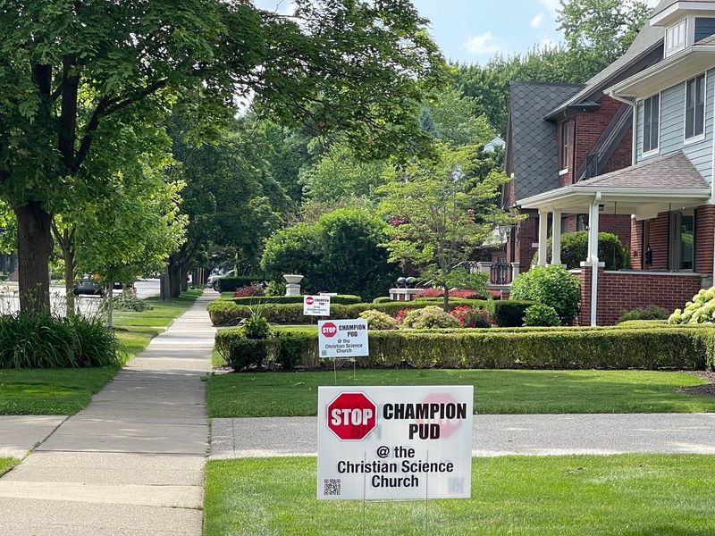 Neighbors near the First Church of Christ, Scientist in Plymouth show opposition to the proposed project.