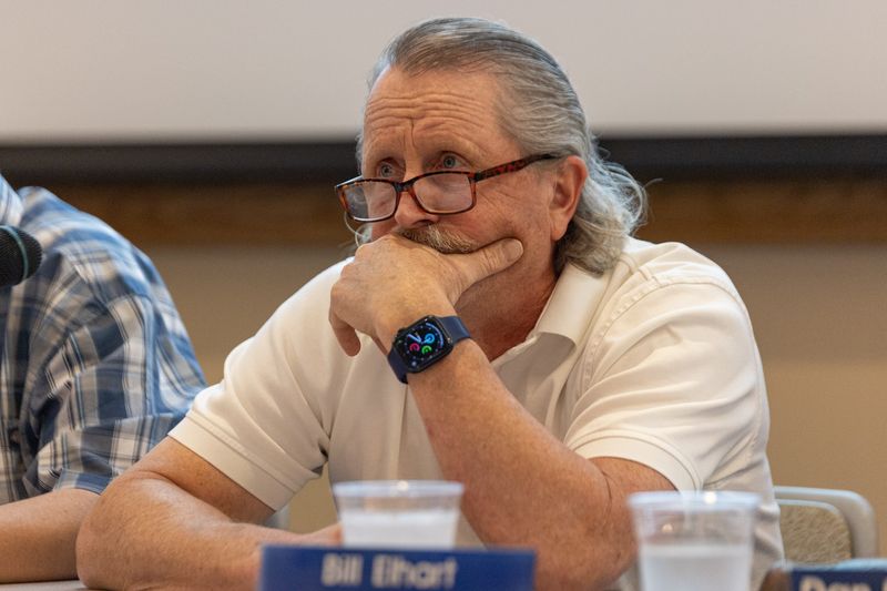 Commissioner Bill Elhart listens as a public commentor speaks during a meeting of the Zeeland Planning Commission on June 25.