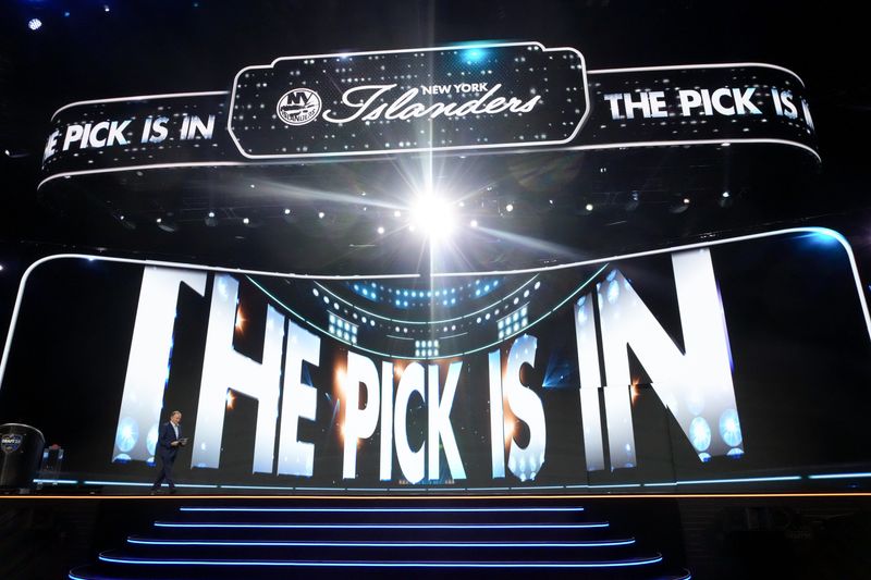 NHL commissioner Gary Bettman walks onto the stage to announce the first overall pick by the New York Islanders in the first round of the 2025 NHL Draft at Peacock Theater in Los Angeles on Friday, June 27, 2025.
