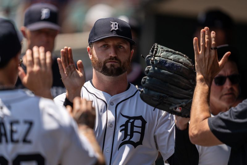 Detroit Tigers Casey Mize celebrates with his teammates in the dugout during a game against the Twins at Comerica Park in Detroit on Saturday, June 28, 2025.
