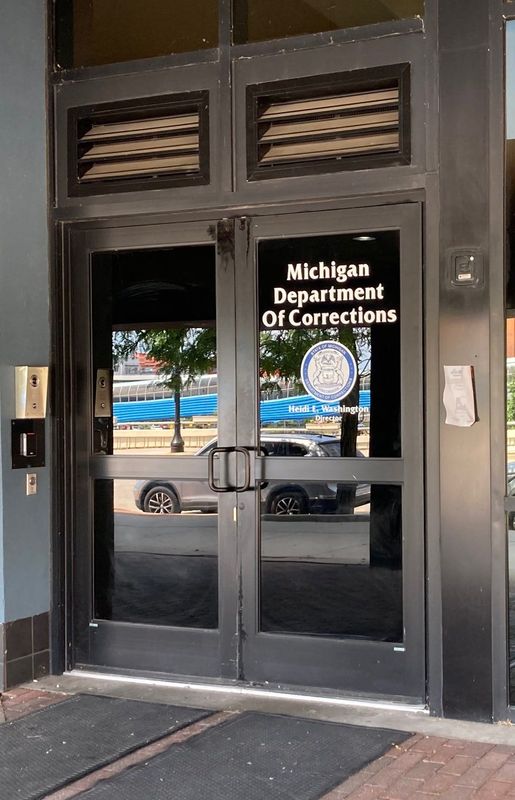 The front entrance to the Lansing headquarters of the Michigan Department of Corrections, photographed on Sunday, June 29, 2025.