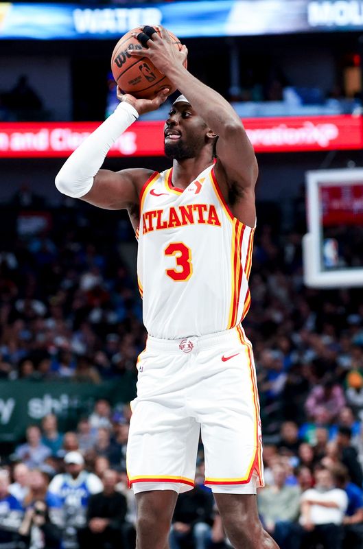Apr 2, 2025; Dallas, Texas, USA; Atlanta Hawks guard Caris LeVert (3) shoots against the Dallas Mavericks during the second half at American Airlines Center.