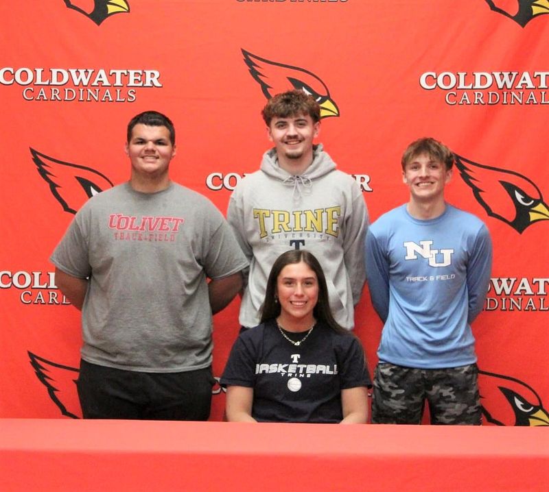 The Coldwater duo of Alex Crabtree (top far left) and Ayden Dirschell (top, middle) are joined by classmates Elli Foley (front row) and Kendall Austin (back row, right) at their signing day