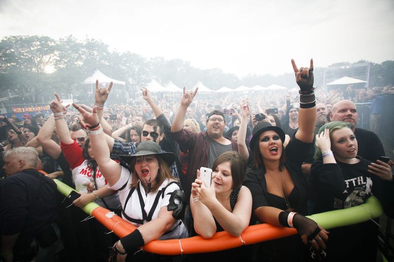 Music fans during In This Moment's set on the main stage Wednesday, July 8, 2015, at the Common Ground Music Festival at Adado Riverfront Park in downtown Lansing.