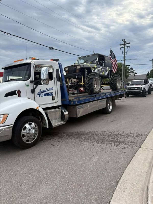 Anytime Towing partnered with Superior Insurance Agency to win the Best Overall award at the Fourth of July parade in downtown Sault Ste. Marie on Friday, July 4, 2025.