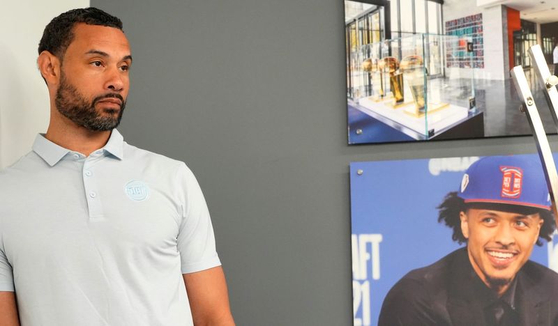 Trajan Langdon, Detroit Pistons president of basketball operations, introduces Chaz Lanier (not pictured) to the media at the Pistons Performance Center in Detroit on Tuesday, July 8, 2025.