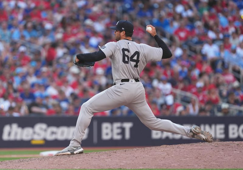 New York Yankees relief pitcher Geoff Hartlieb throws a pitch against the Toronto Blue Jays during the eighth inning at Rogers Centre in Toronto, July 1, 2025.
