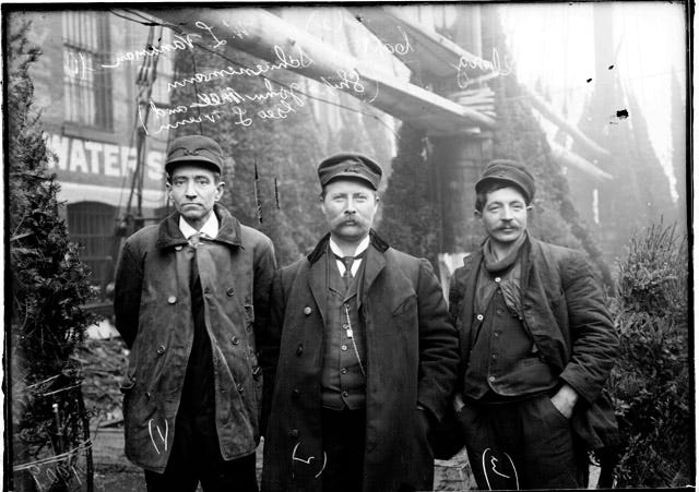 Capt. Herman Schuenamann (center) and crew of the Rouse Simmons.