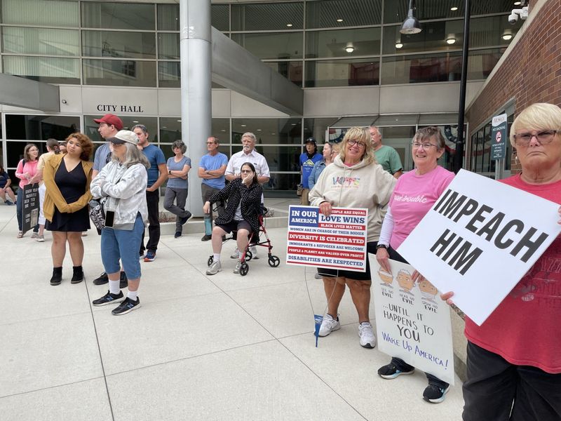 About 75 people attended July 17's Good Trouble vigil/protest on the grounds of the Monroe County Courthouse and Monroe City Hall in downtown Monroe. Many held protest signs.