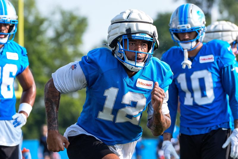Detroit Lions wide receiver Tim Patrick (12) practices during training camp at Meijer Performance Center in Allen Park on Thursday, July 24, 2025.