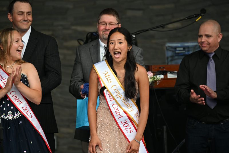 Brooklin Schwenke reacts with surprise as she is announced the new Charlevoix Venetian Queen during the coronation ceremony on Wednesday, July 23, 2025.