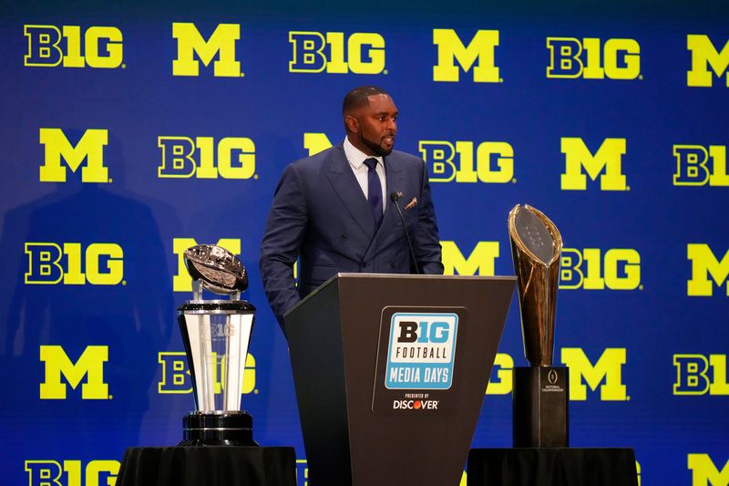 Michigan head coach Sherrone Moore speaks to the media during the Big Ten NCAA college football media days at Mandalay Bay Resort in Las Vegas on Thursday, July 24, 2025.