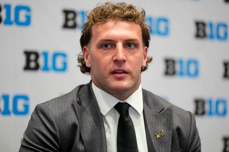 Jul 24, 2025; Las Vegas, NV, USA; Michigan tight end Max Bredeson speaks to the media during the Big Ten NCAA college football media days at Mandalay Bay Resort. Mandatory Credit: Lucas Peltier-Imagn Images