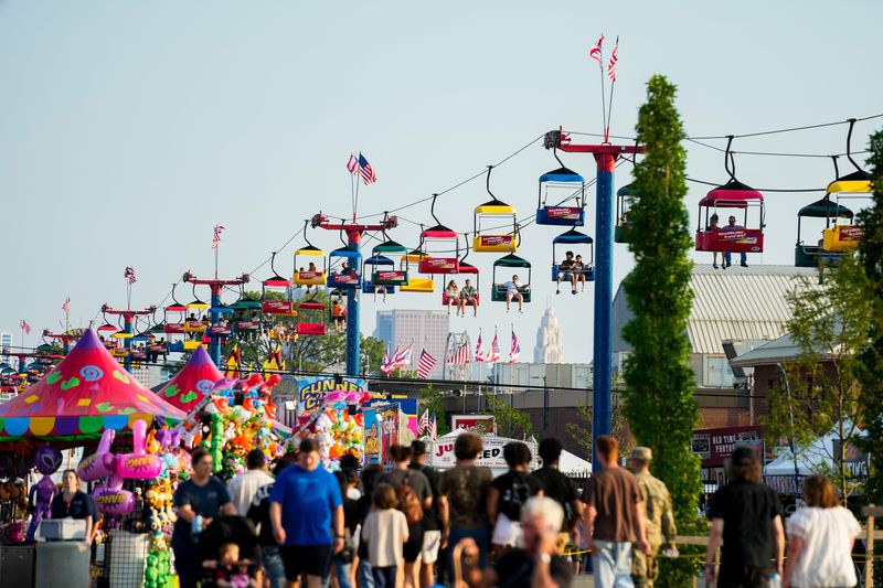 Guests walk around the state fairgrounds on Thursday, July 24.