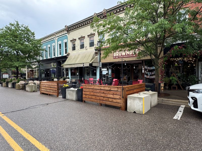 Permitted patio setups, like this one pictured outside Browndog, Le George Mediterranean Bar and Table 5 on July 25, 2025, could soon be removed under a court motion challenging Northville's longstanding on-street dining tradition.