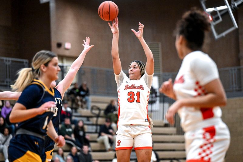Belleville's Sydney Savoury makes a 3-pointer against DeWitt during the second quarter on Tuesday, March 18, 2025, in the D1 state quarterfinal at Holt High School.