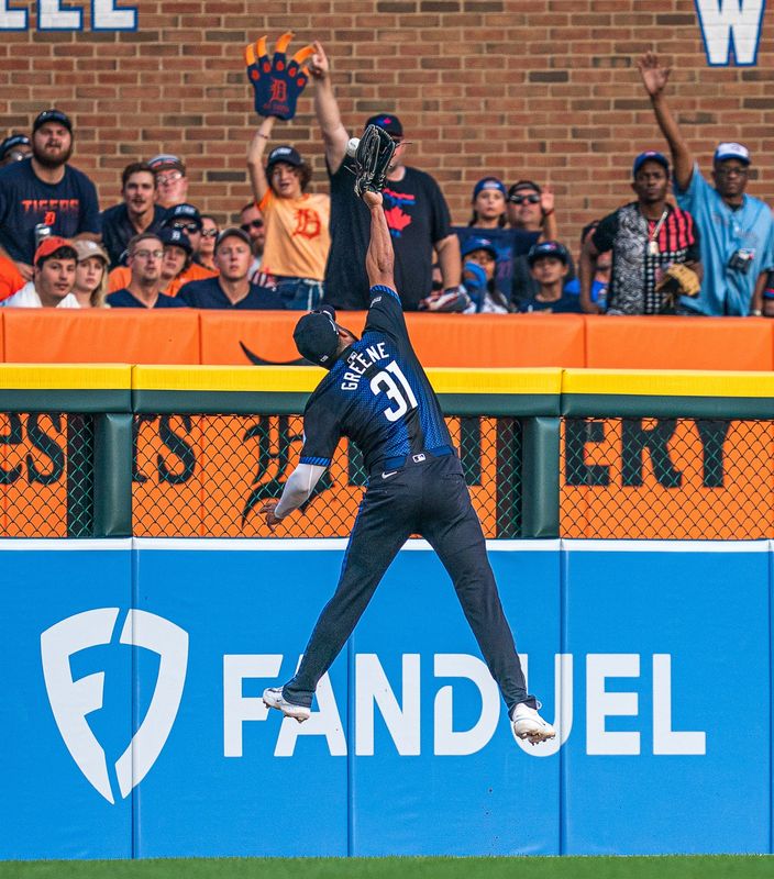 Detroit Tigers outfielder Riley Greene (31) jumps for an outfield ball in the 3rd inning during a game against the Toronto Blue Jays on Friday, July 27, 2025 at Comerica Park in Detroit.